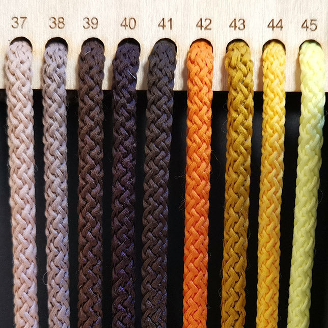 Polyester cord in brown colours. 200 meters each spool. Cord is good for macrame and crochet projects