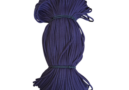 Coiled blue rope on a white background