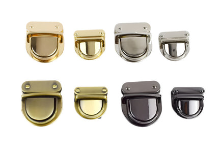 Set of four metal bag locks in gold, silver, antique brass, and gunmetal, displayed on a white background.