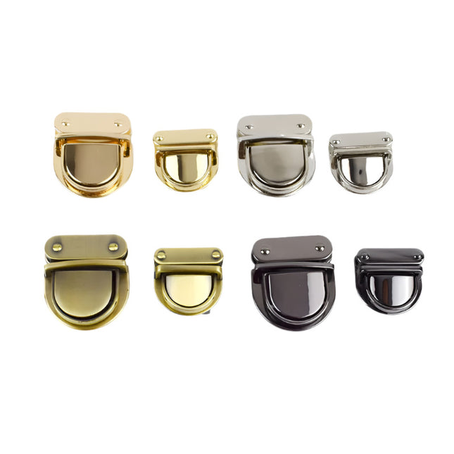 Set of four metal bag locks in gold, silver, antique brass, and gunmetal, displayed on a white background.