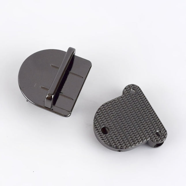 Set of four metal bag locks in gold, silver, antique brass, and gunmetal, displayed on a white background.