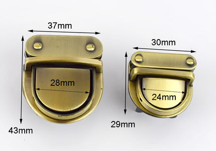 Gold triangle-shaped metal bag lock with measurements of 44 mm width, 31 mm height, and 4 mm thickness.