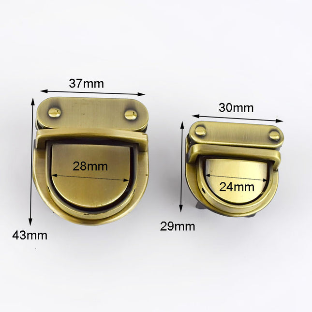 Gold triangle-shaped metal bag lock with measurements of 44 mm width, 31 mm height, and 4 mm thickness.